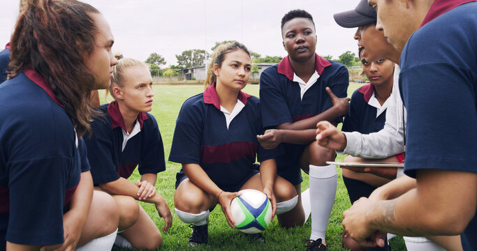 Advice, coaching and rugby with women on field for teamwork, game plan and discussion together. Sports strategy, defense formation and training tips with people in stadium for mentor and fitness