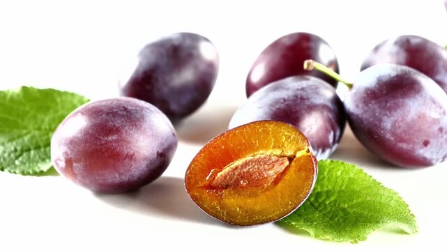 fresh plums isolated on white