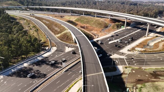 Aerial drone view above the M7 -M12 Interchange at Cecil Hills, Western Sydney, NSW Australia on a sunny morning in June 2026