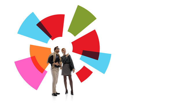 Business couple exploring colorful circular strategy chart in abstract planning scene. Concept of market analysis, business vision, planning process, segmentation and strategic review.