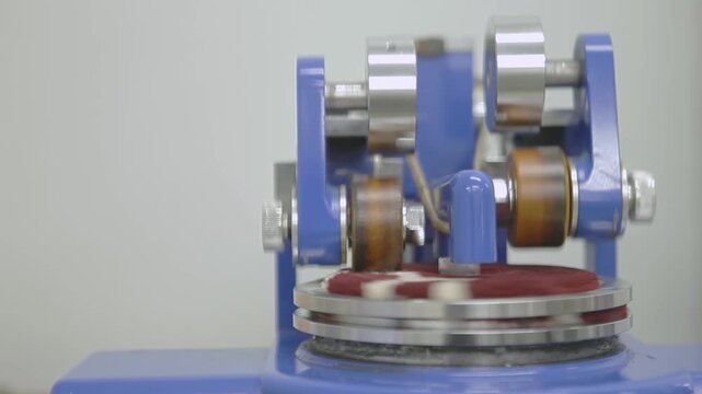 Industrial Fabric Abrasion Testing Machine Operating in Laboratory