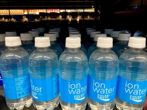 pocari sweat ion water plastic bottles arranged on a store shelf