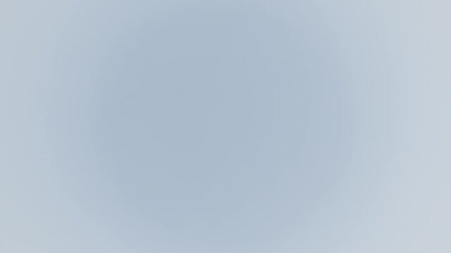 Abstract soft white and light gray blurred radial gradient background template in horizontal orientation