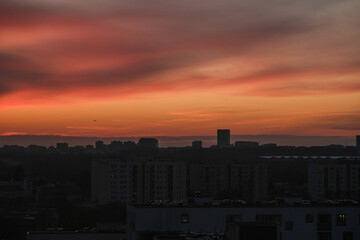 Obraz premium Warsaw city skyline during red sunset