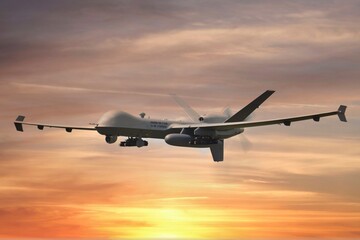 Obraz premium Drone Reaper en vol ciel fin de journée