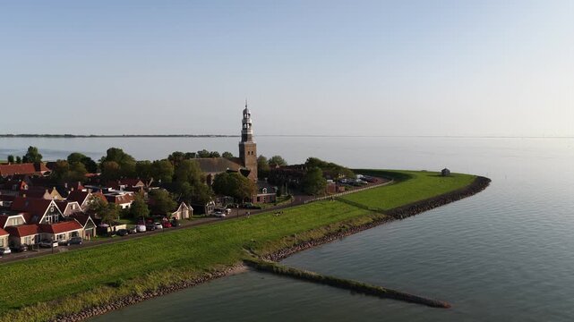 Aerial view of hindeloopen village coastline and church tower