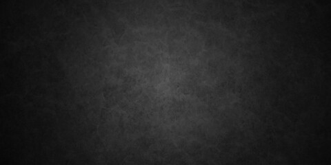 Fototapeta premium Dark charcoal grunge wall texture background. Dark black rough grunge surface with smoke edge. Black texture chalk board and black board.