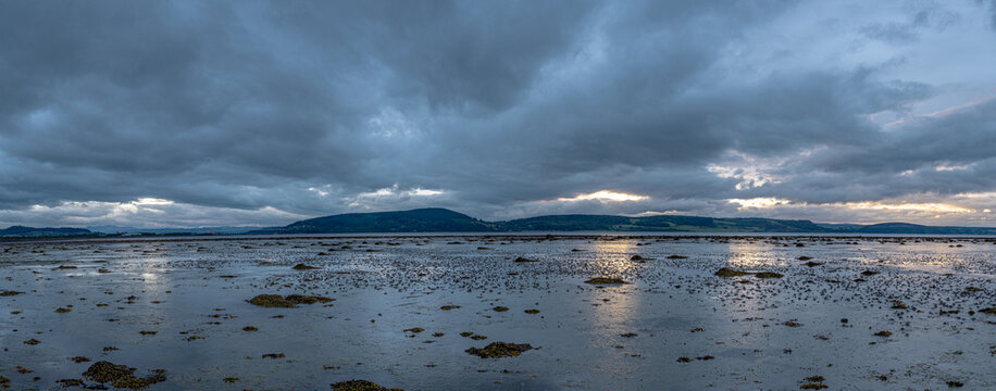 nverness Firth at Low Tide with Dramatic Stormy Sky and Distant Hills, Scotland