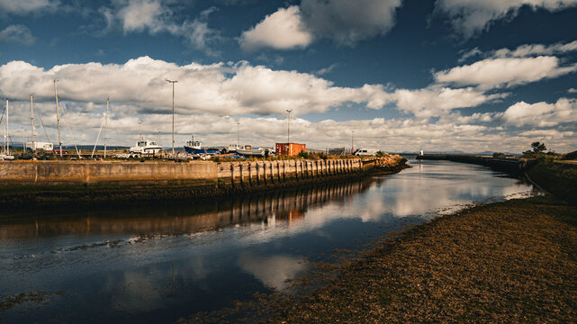 Nairn Harbour with Sailing Boats and Cloud Reflections in Calm Water, Scotland