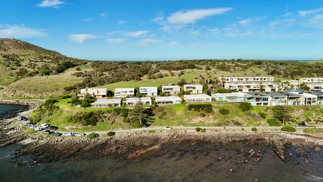Encounter Bay, South Australia - 4K Aerial Drone view of Rocky Shoreline, Oceanfront Homes, Coastal Reserve, Walking Trails near Victor Harbor