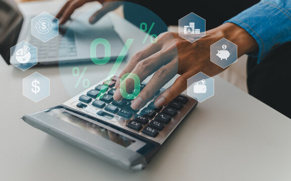Man using calculator for financial calculation, percent interest rate, banking, savings and tax planning, investment analysis accounting, finance consulting, sme loan and business financial strategy