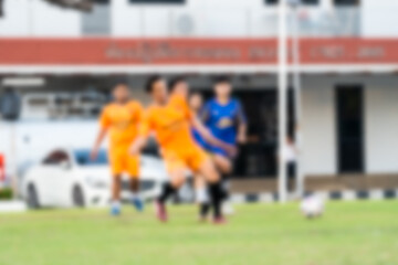 Obraz premium Blurred background of children are practicing soccer in football field
