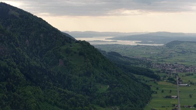 Village in Switzerland near Lake Walen Walensee Europe Swiss hills, aerial drone