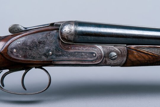 Vintage shotgun receiver with ornate engravings and wooden stock in a professional macro studio shot for collectors and hunting history marketing