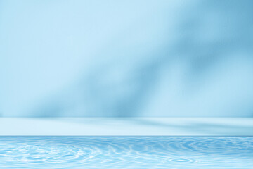 Naklejka na ściany i meble Water texture with light surface on blue wall background,Backdrop Summer nature sunlight,shadow reflection on podium display and water waves pattern for beauty,spa,cosmetic on summer product presen