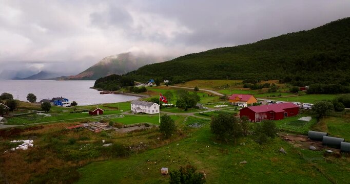 Aerial view of Kvitnes Gaard farm, restaurant and wedding venue by the fjord in Sortland, Vesteralen, Northern Norway