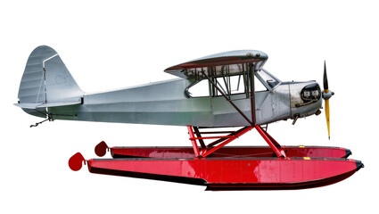 Vintage silver seaplane with red floats and yellow propeller © Sarah