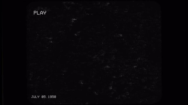 Vintage VHS home video recording with play overlay and date stamp.