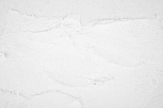 Textured white plaster surface