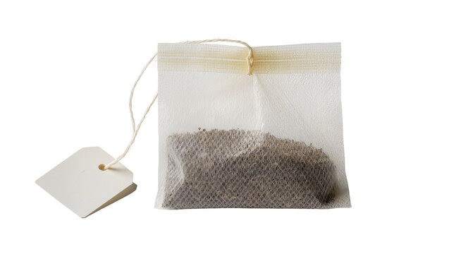 Tea bag with string and blank tag filled with dry tea leaves