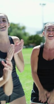 Women, cheering and applause for sport success, happy and excited for win with team and celebration. Outdoor, fitness and people with smile for achievement, clapping and competition victory on field