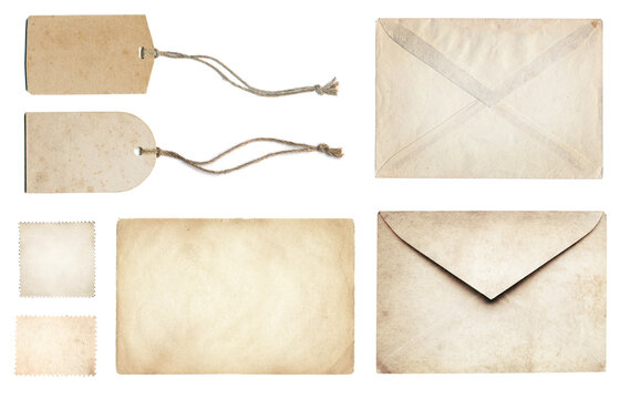 Ancient papers collection: letterhead, envelope, postcard, postage stamp, tag label, old paper blank isolated on white background. Retro style design.