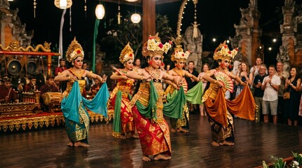 Naklejka premium Traditional Indonesian dance performance with colorful costumes, cultural celebration