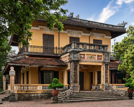 Hue, Vietnam - April 24, 2026: TINI MINH BUILDING, Imperial City. Historic yellow building, former clinic for Empress Thanh Cung, later President Dao Dai's residence, Traditional architecture