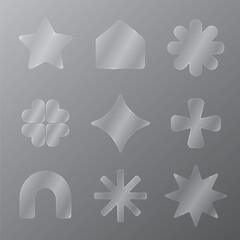 Obraz premium Glossy geometric shapes on gray vector element set