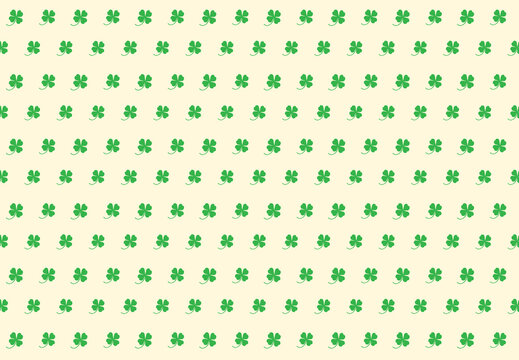 Clover leaves for the background. Green clover leaves on a Cornsilk background for the background.