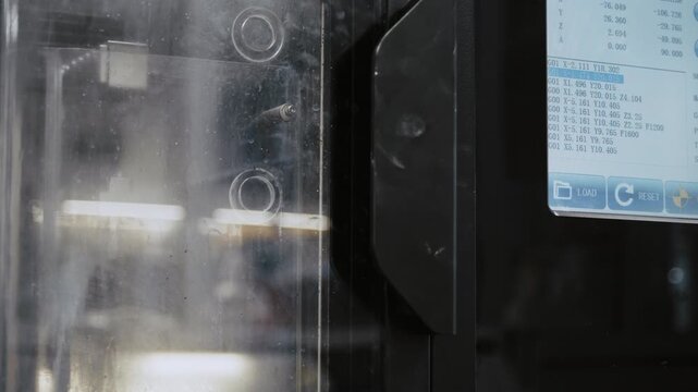 Modern CNC dental milling machine carving a zirconia disc for dental crowns in a laboratory