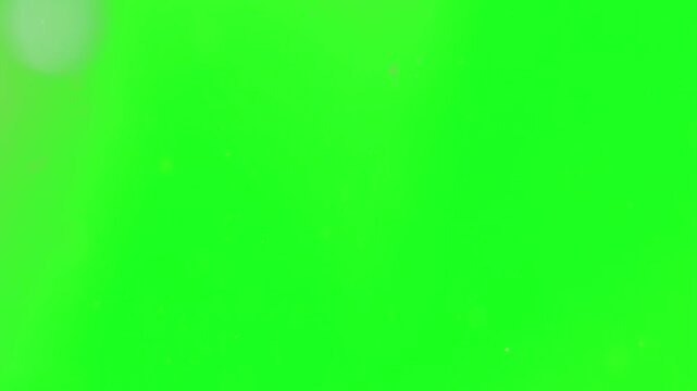 Sparkles twinkling dynamically on a green screen key backdrop bringing a fantasy fairytale effect perfect for enchanted cinematic overlays, luxury designs, and elegant media production professio.