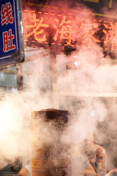Steamed dumplings cooking in bamboo baskets, Xi'an, Shaanxi, China