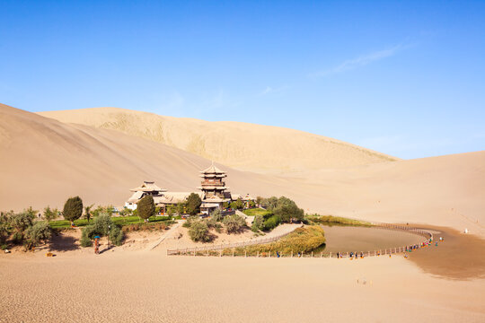 Crescent lake in the singing sand dunes, Dunhuang, Gansu, China