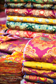Colorful textiles and fabrics for sale at the bazaar in Kashgar, China
