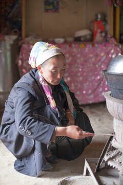 Kyrgyz family interior life inside a yurt, Karakul, Xinjiang, China