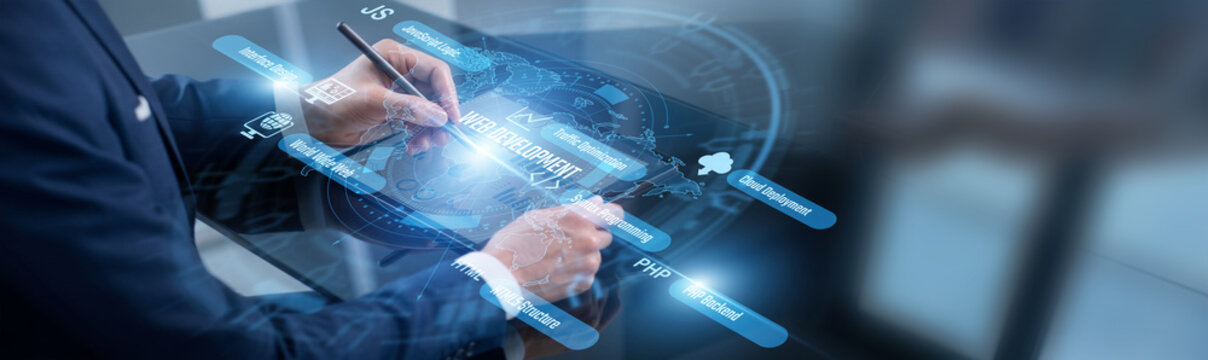 Frontend developer point of custom web development. Developer using tablet writing clean code across the secure hosting network. Building dynamic websites and enhancing user interfaces.