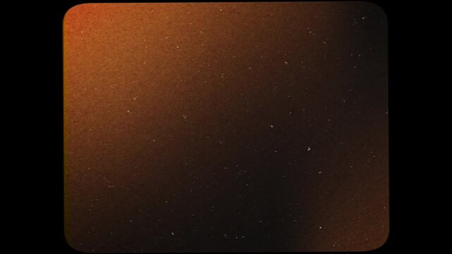Vintage film grain overlay with dust and scratches on dark background.