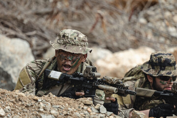 Naklejka premium US Marine, Military Special forces soldier under heavy enemy fire intense battlefield engagement
