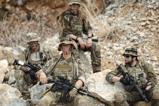Military special forces soldier team in combat operation, tactical military portrait in action