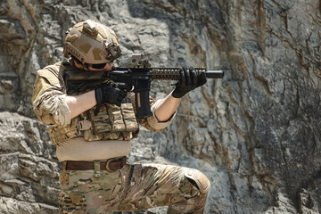 Naklejka premium US Special forces soldiers engaged in combat operation, tactical military team in action
