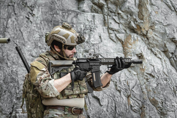 Naklejka premium US Special forces soldiers engaged in combat operation, tactical military team in action
