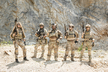 Naklejka premium Military special forces soldier team in combat operation, tactical military portrait in action