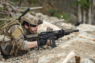 Fototapeta premium US Special forces soldiers engaged in combat operation, tactical military team in action