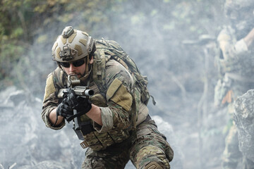 Fototapeta premium US Marine, Military Special forces soldier under heavy enemy fire intense battlefield engagement