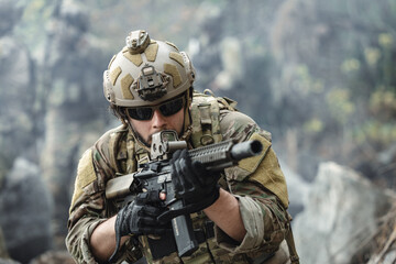 Fototapeta premium US Marine, Military Special forces soldier under heavy enemy fire intense battlefield engagement