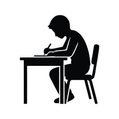 Fototapeta premium Silhouette of a boy student writing at a desk, learning concept