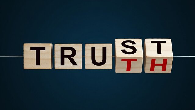Truth concept, wooden blocks, word on blocks, honesty, integrity, dark background