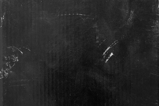 grunge overlay effect with scratch and dust on black background,retro old noisy grain dust texture for film or photo overlay,grunge distressed texture overlay texture background