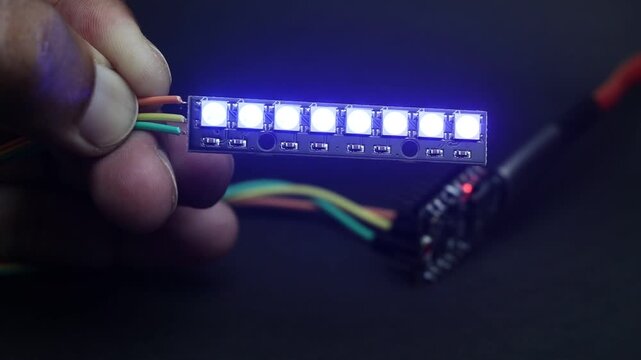Microcontroller controlled addressable RGB LED strip with 8 Individually addressable glowing LEDs